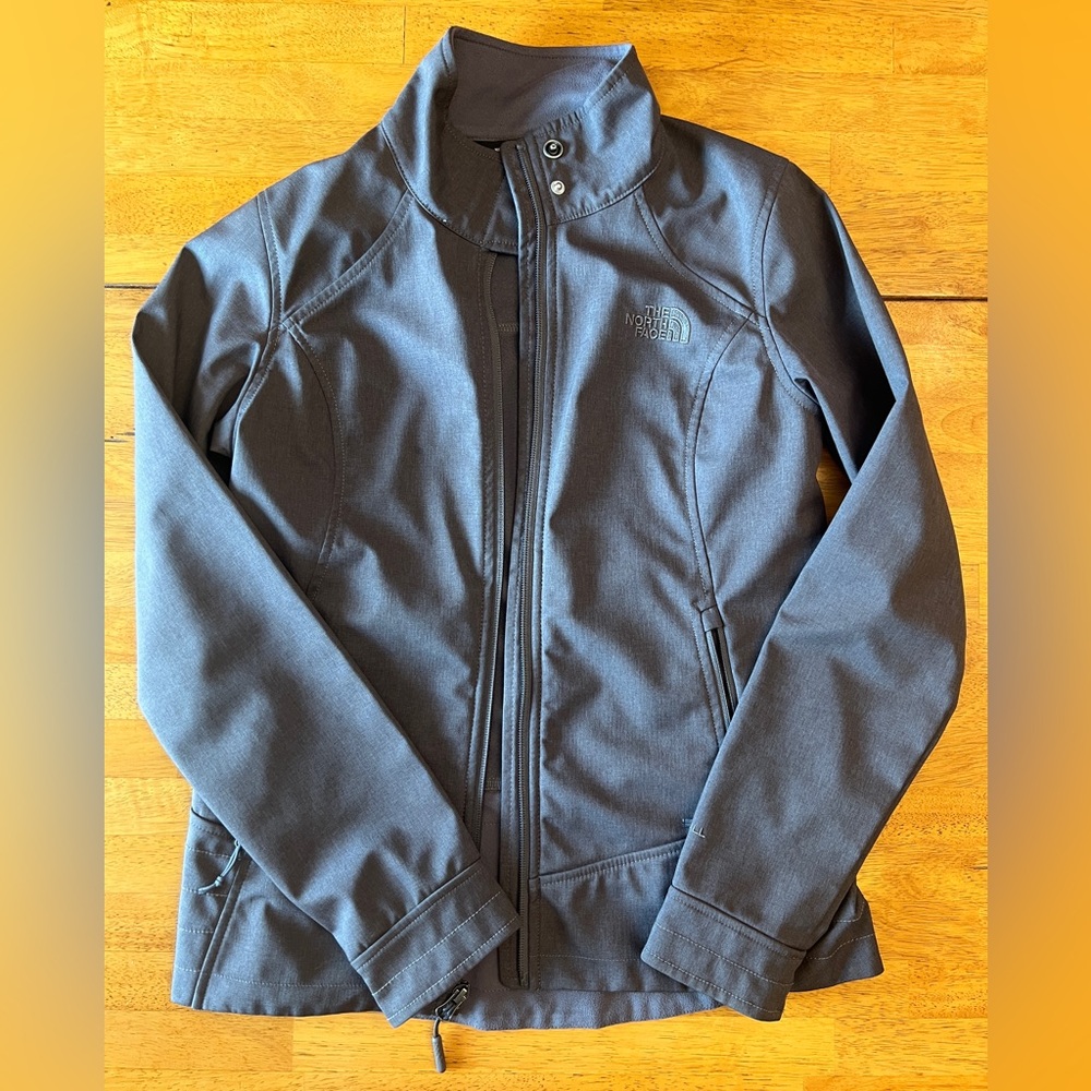 Women’s North Face polyester soft shell jacket. Adult S. Light purple in color.